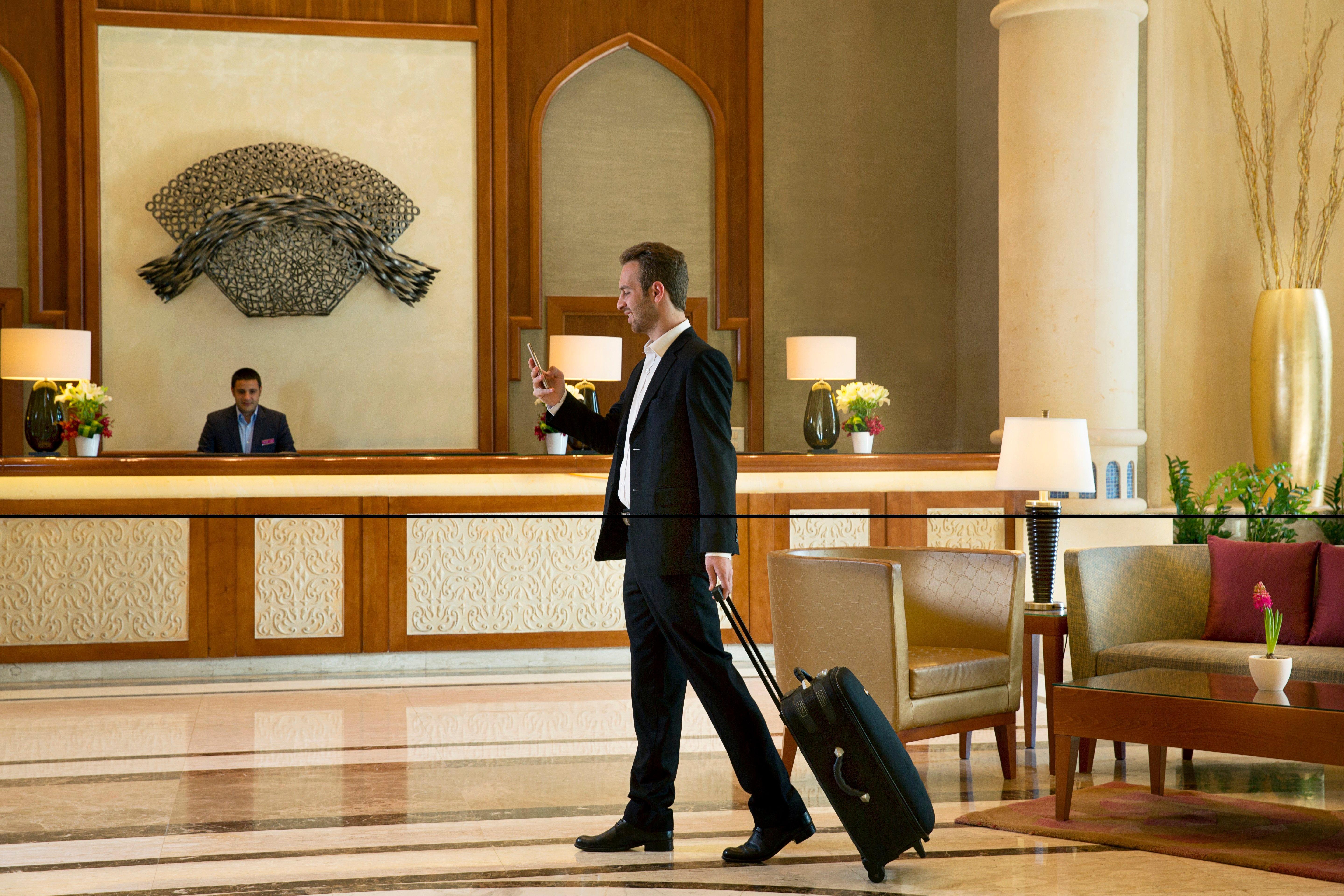 Crowne Plaza Jordan Dead Sea Resort & Spa By Ihg Sweimeh Luaran gambar A guest checking in at a hotel